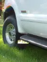 Ford F250/350/450 Front drill‑less mud flaps, 1999 – 2007