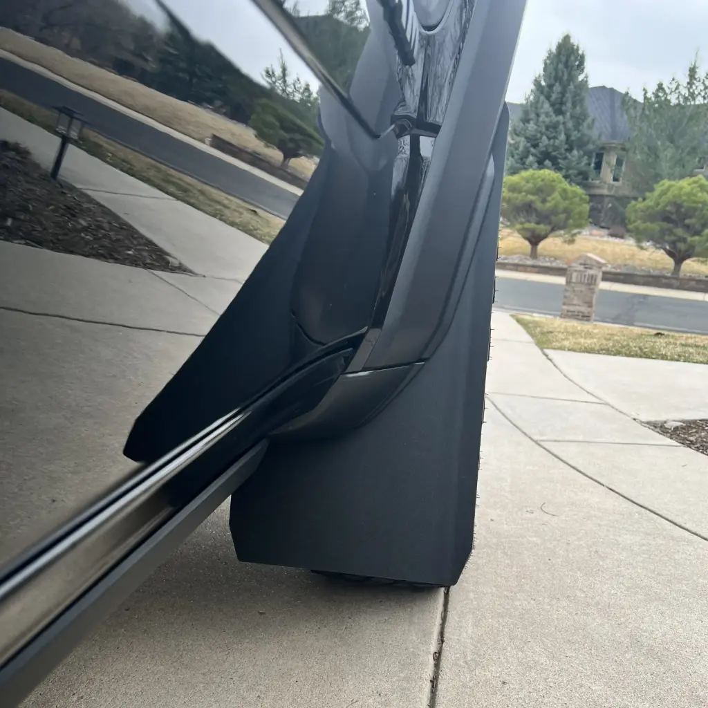 Ram 1500 TRX/RHO Front drill‑less mud flaps, 2021-2026 