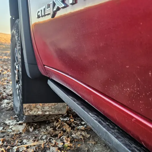 [009343] GMC 2500 AT4X Front drill‑less mud flaps, 2024 – current